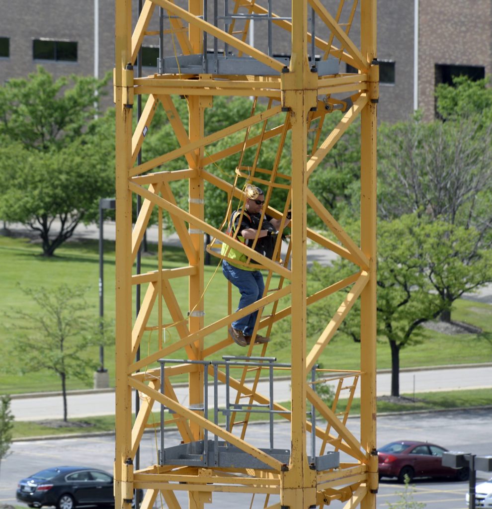 Michael Collins descends the 140 stairs at the end of the day working in his tower crane at the construction site of the new Zurich Insurance Headquarters in Schaumburg.