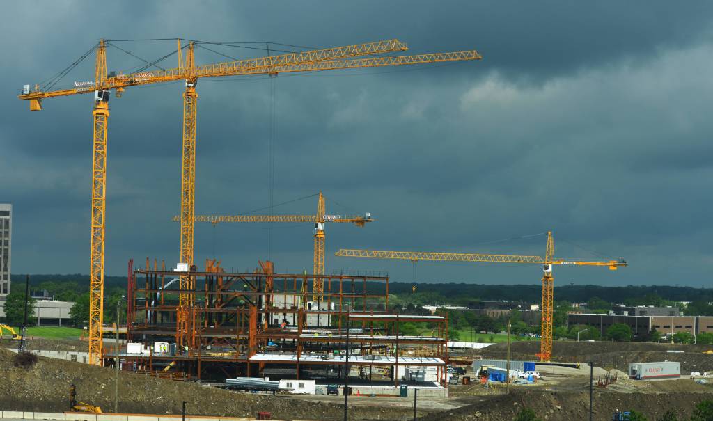 Four tower cranes work the construction site at the new location of Zurich Insurance North America Headquarters in Schaumburg. Michael Collins works in the third highest tower crane on site with a height of 155 feet in the air, with the highest measuring in at 280 feet.